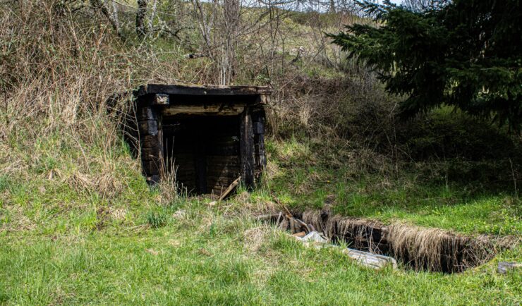 Entrance to an abandoned mine in a hillside